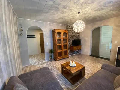 Ein Sitzbereich in der Unterkunft Ferienwohnung am Kirchberg