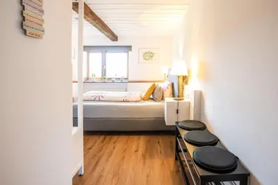Ein Bett oder Betten in einem Zimmer der Unterkunft Pension Schwedenkreuz