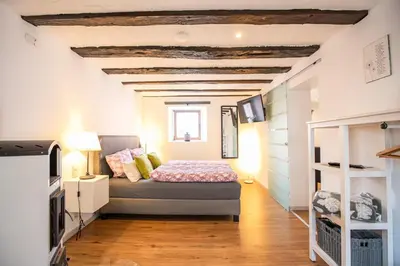 Ein Bett oder Betten in einem Zimmer der Unterkunft Pension Schwedenkreuz