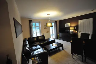 Ein Sitzbereich in der Unterkunft Apartments / Ferienwohnungen Moseluferstrasse
