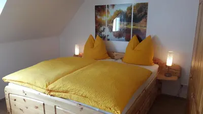 Ein Bett oder Betten in einem Zimmer der Unterkunft Haus Madle