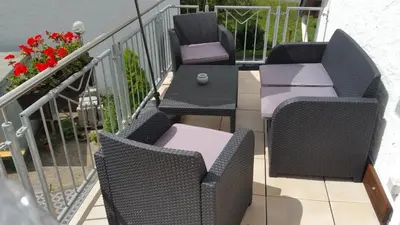 Ein Sitzbereich in der Unterkunft Haus Madle
