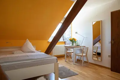 Ein Bett oder Betten in einem Zimmer der Unterkunft Scheid´s Hotel – Restaurant