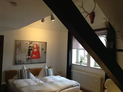 Ein Bett oder Betten in einem Zimmer der Unterkunft Scheid´s Hotel – Restaurant