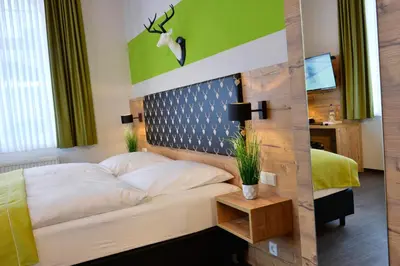 Ein Bett oder Betten in einem Zimmer der Unterkunft Landhaus Elbert