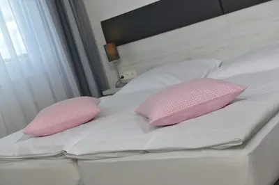 Ein Bett oder Betten in einem Zimmer der Unterkunft Landhaus Elbert