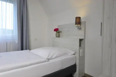 Ein Bett oder Betten in einem Zimmer der Unterkunft Landhaus Elbert