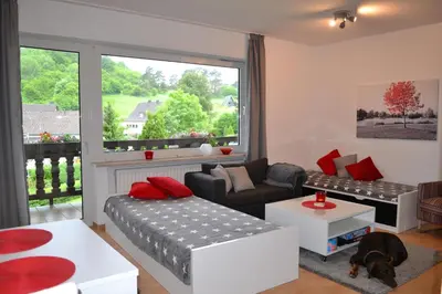 Ein Sitzbereich in der Unterkunft Ferienhaus Munterley