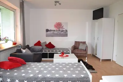 Ein Sitzbereich in der Unterkunft Ferienhaus Munterley