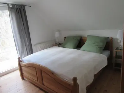 Ein Bett oder Betten in einem Zimmer der Unterkunft EIFEL Gästewohnung