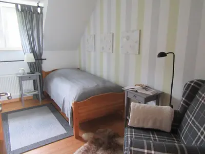 Ein Bett oder Betten in einem Zimmer der Unterkunft EIFEL Gästewohnung