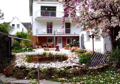 Ein Garten an der Unterkunft Ferienwohnung-Mosel