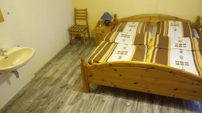 Ein Bett oder Betten in einem Zimmer der Unterkunft Ferienhaus Raue