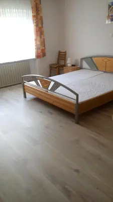 Ein Bett oder Betten in einem Zimmer der Unterkunft Ferienhaus Raue