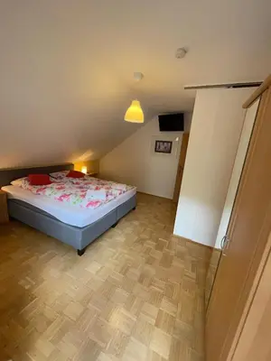 Ein Bett oder Betten in einem Zimmer der Unterkunft Ferienhaus Jobelius