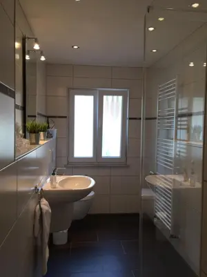 Ein Badezimmer in der Unterkunft Ferienhaus im Nürburgring