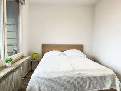Ein Bett oder Betten in einem Zimmer der Unterkunft Apartment Höhenblick - A1011 by Interhome