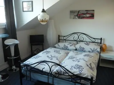 Ein Bett oder Betten in einem Zimmer der Unterkunft Hotel an der Fähre