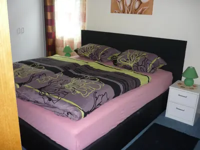 Ein Bett oder Betten in einem Zimmer der Unterkunft Hotel an der Fähre