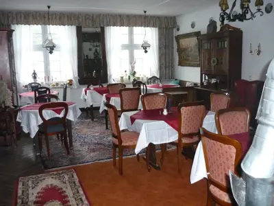 Ein Sitzbereich in der Unterkunft Hotel an der Fähre