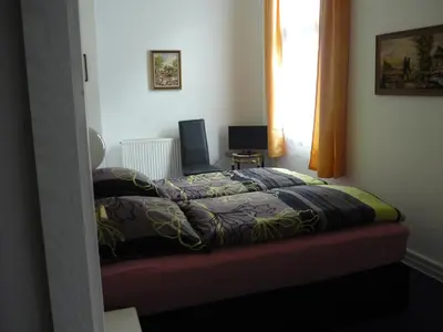 Ein Bett oder Betten in einem Zimmer der Unterkunft Hotel an der Fähre