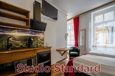 Ein Bett oder Betten in einem Zimmer der Unterkunft MoselUnion - Aparthotel Landsknecht