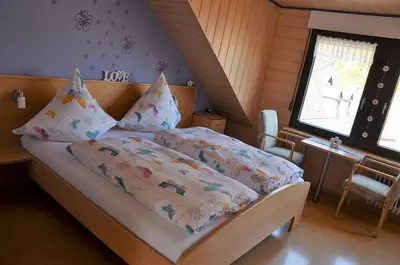 Ein Bett oder Betten in einem Zimmer der Unterkunft Ferienwohnung Lenartz