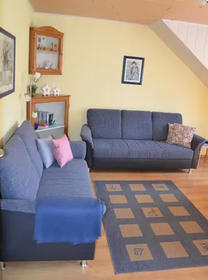Ein Sitzbereich in der Unterkunft Ferienwohnung Lenartz