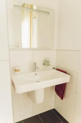 Ein Badezimmer in der Unterkunft FEWO Kaufmann