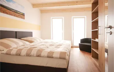 Ein Bett oder Betten in einem Zimmer der Unterkunft Ferienhaus 1 Wolfschlucht