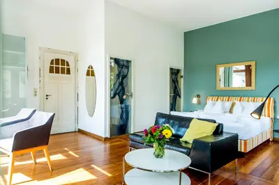 Ein Bett oder Betten in einem Zimmer der Unterkunft Hotel Villa Vinum Cochem