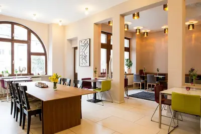 Ein Sitzbereich in der Unterkunft Hotel Villa Vinum Cochem