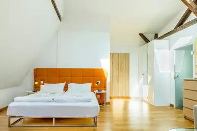 Ein Bett oder Betten in einem Zimmer der Unterkunft Hotel Villa Vinum Cochem