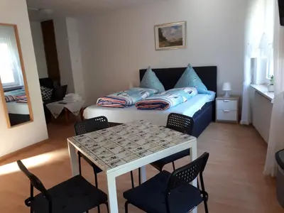 Ein Bett oder Betten in einem Zimmer der Unterkunft Gästehaus Ziemons
