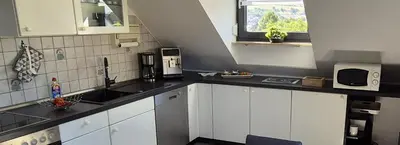Küche/Küchenzeile in der Unterkunft FewoSa Trier-Tarforst