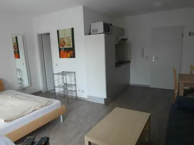 Ein Bett oder Betten in einem Zimmer der Unterkunft Apartmentcenter Koblenz