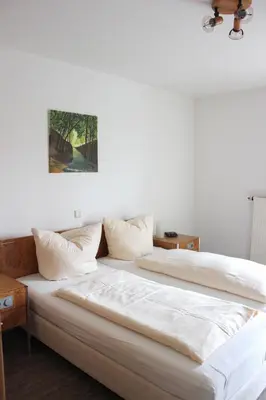 Ein Bett oder Betten in einem Zimmer der Unterkunft Apartmentcenter Koblenz