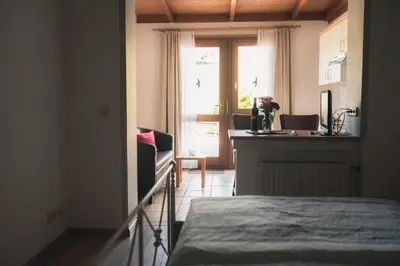 Ein Bett oder Betten in einem Zimmer der Unterkunft Urlaubsweingut Zecherhof