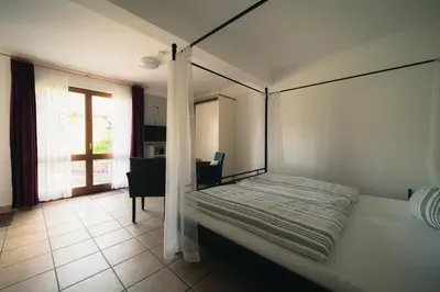 Ein Bett oder Betten in einem Zimmer der Unterkunft Urlaubsweingut Zecherhof