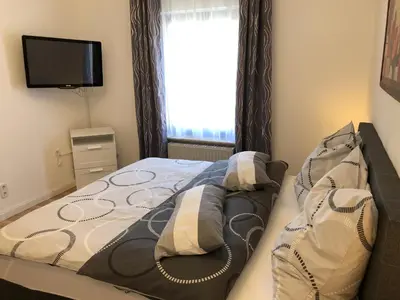 Ein Bett oder Betten in einem Zimmer der Unterkunft Haus am Mühlbach