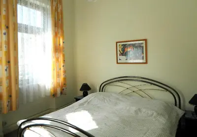 Ein Bett oder Betten in einem Zimmer der Unterkunft Ferienwohnung Burgblick