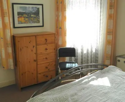 Ein Bett oder Betten in einem Zimmer der Unterkunft Ferienwohnung Burgblick