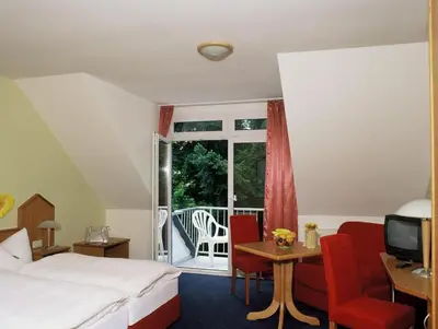 Ein Bett oder Betten in einem Zimmer der Unterkunft Hotel zur Post