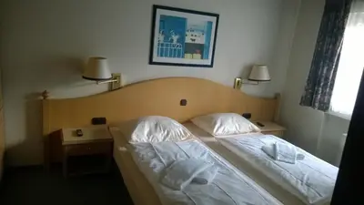 Ein Bett oder Betten in einem Zimmer der Unterkunft Blick in die Südeifel