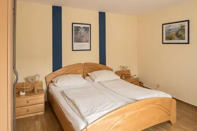 Ein Bett oder Betten in einem Zimmer der Unterkunft Gästezimmer Strauß