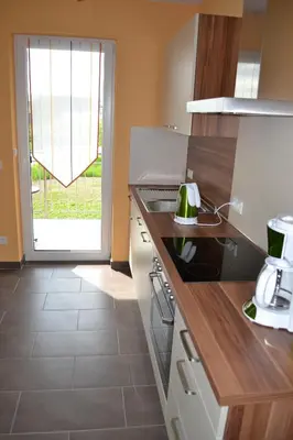Küche/Küchenzeile in der Unterkunft Gästehaus Weingut Mathy-Schanz