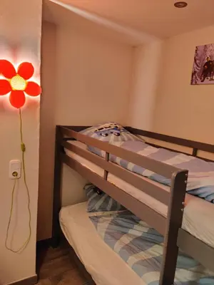 Ein Bett oder Betten in einem Zimmer der Unterkunft Ferienhaus am Sauerbrunnen