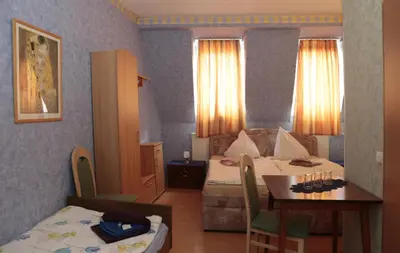 Ein Bett oder Betten in einem Zimmer der Unterkunft Hotel Sessellift
