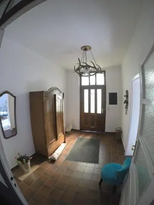 Ein Bett oder Betten in einem Zimmer der Unterkunft Zum Alten Pfarrhaus