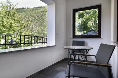 Ein Balkon oder eine Terrasse in der Unterkunft Hotel garni 